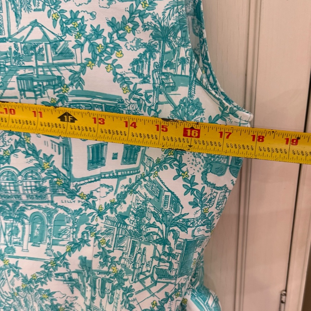 VTG RARE LILLY PULITZER WRAP SHIRT Size 10
Worth Ave pattern like new - Picture 6 of 8